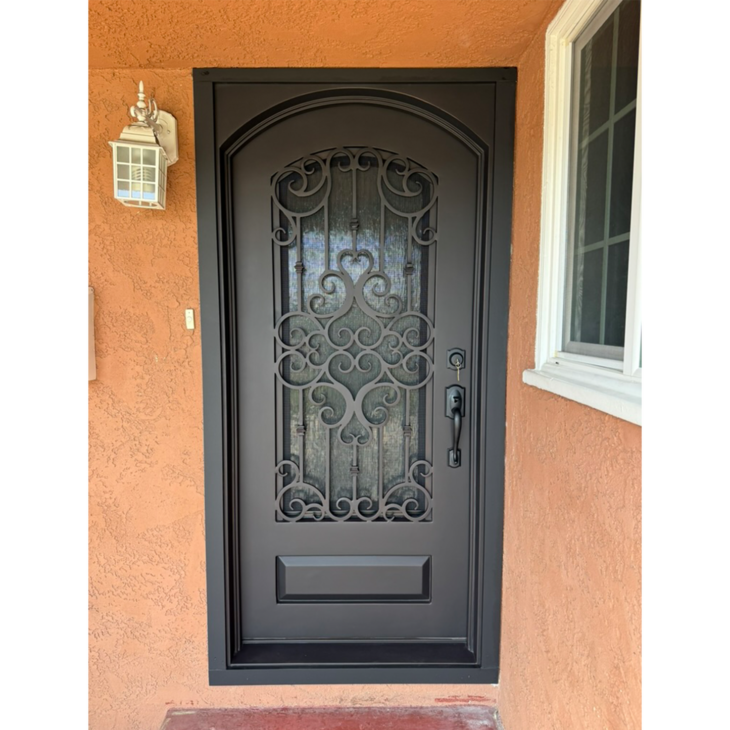 Center Crest Iron Door – Arched Single Security Door with Rain Glass & Screen