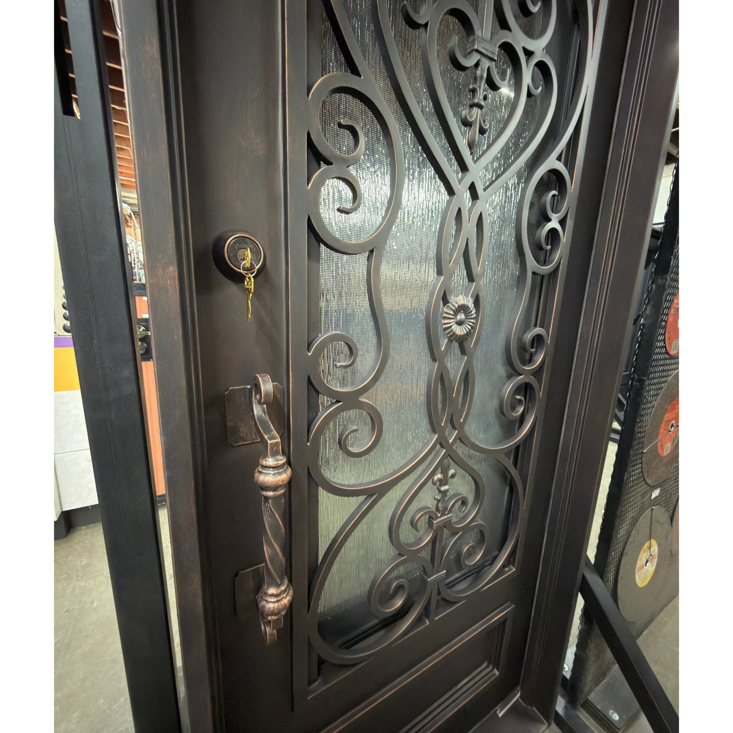Decorative metal screen with intricate scrollwork design.
